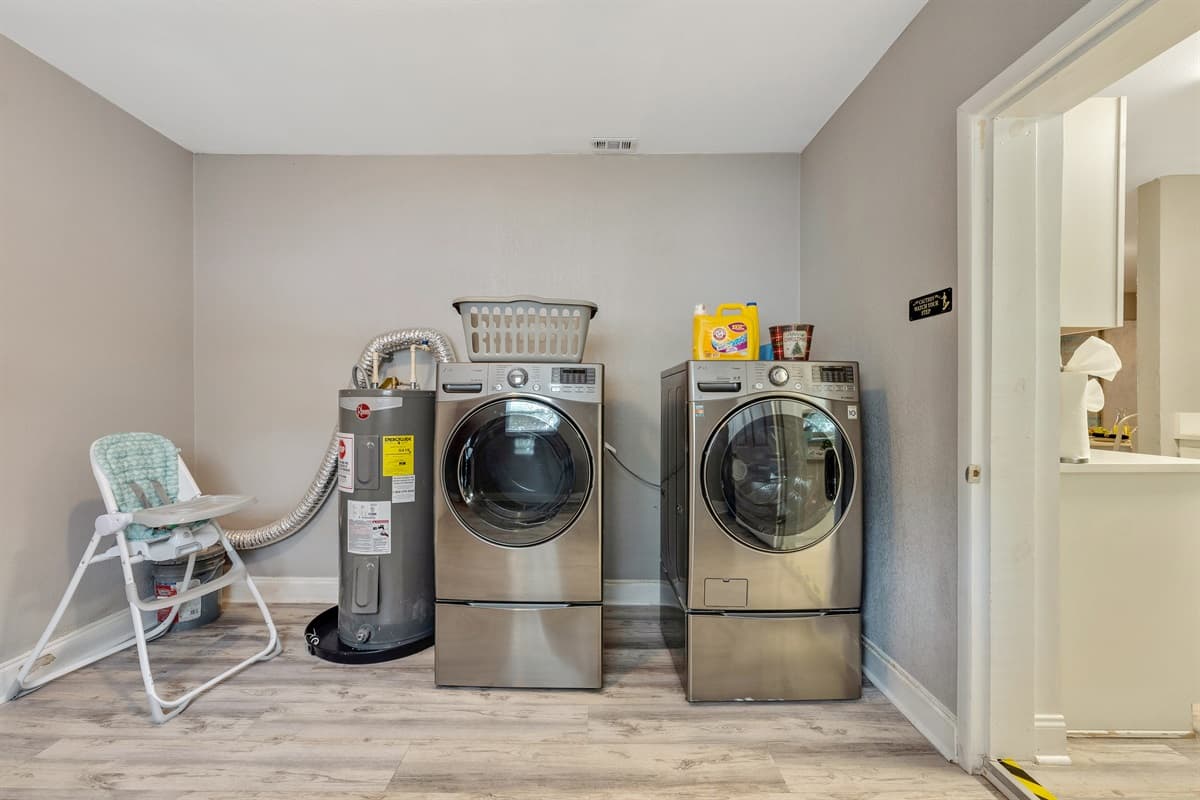 Our laundry area is not just a space for chores; it's a choreographed symphony of functionality and flair.