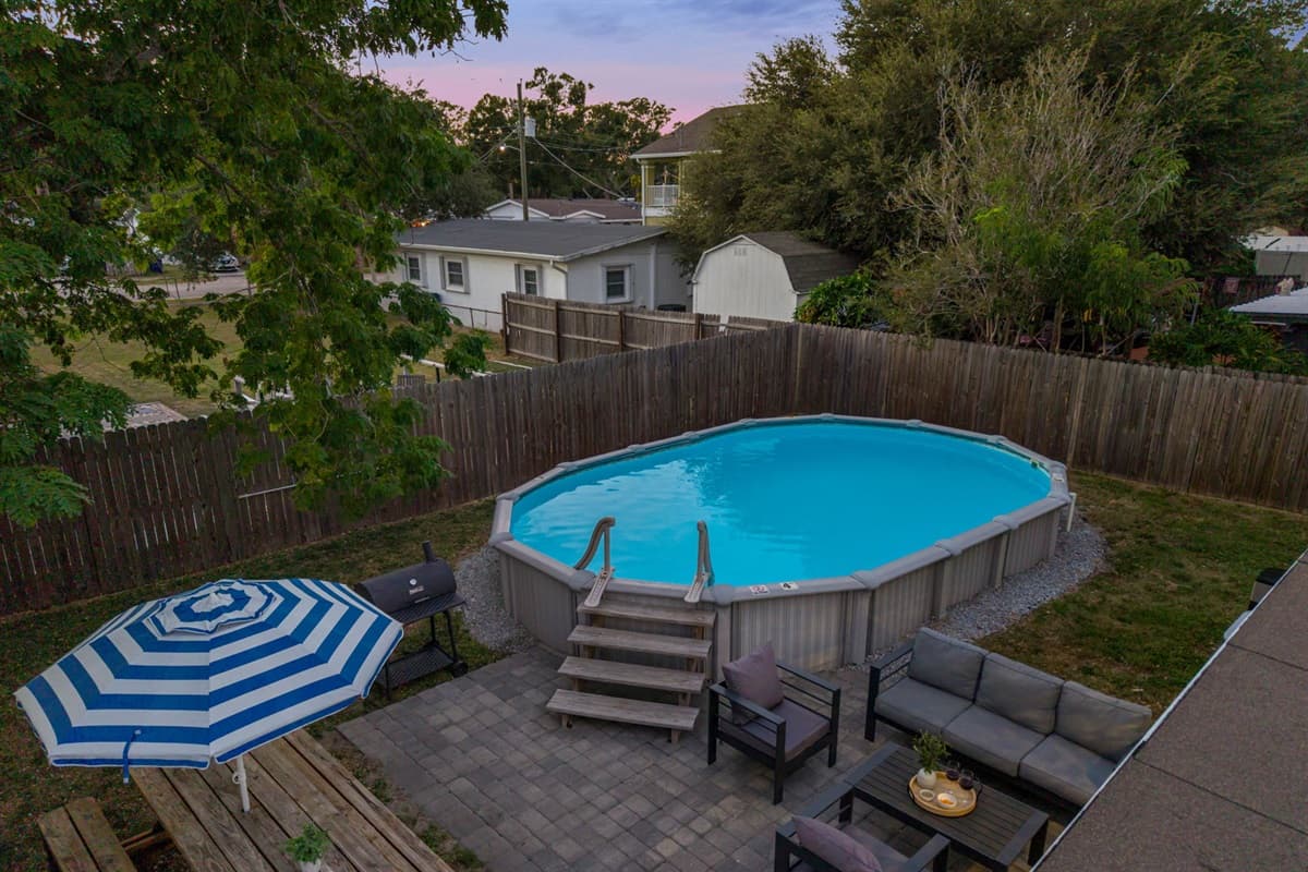 A tranquil escape featuring a private pool and relaxing outdoor seating.