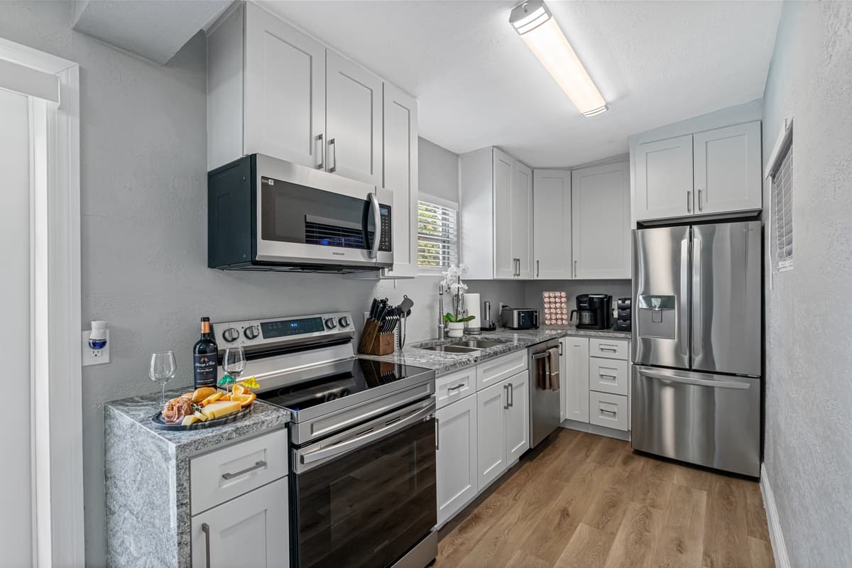 The countertops are made of high-quality materials and provide ample workspace for preparing meals.