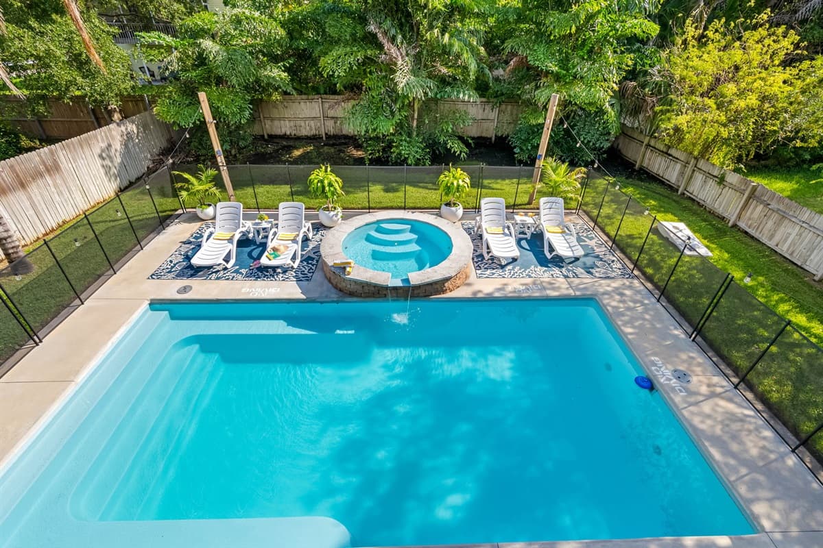 Escape to a backyard built for making memories — enjoy sunny swims, outdoor dining, and the soothing vibe of this beautiful space.