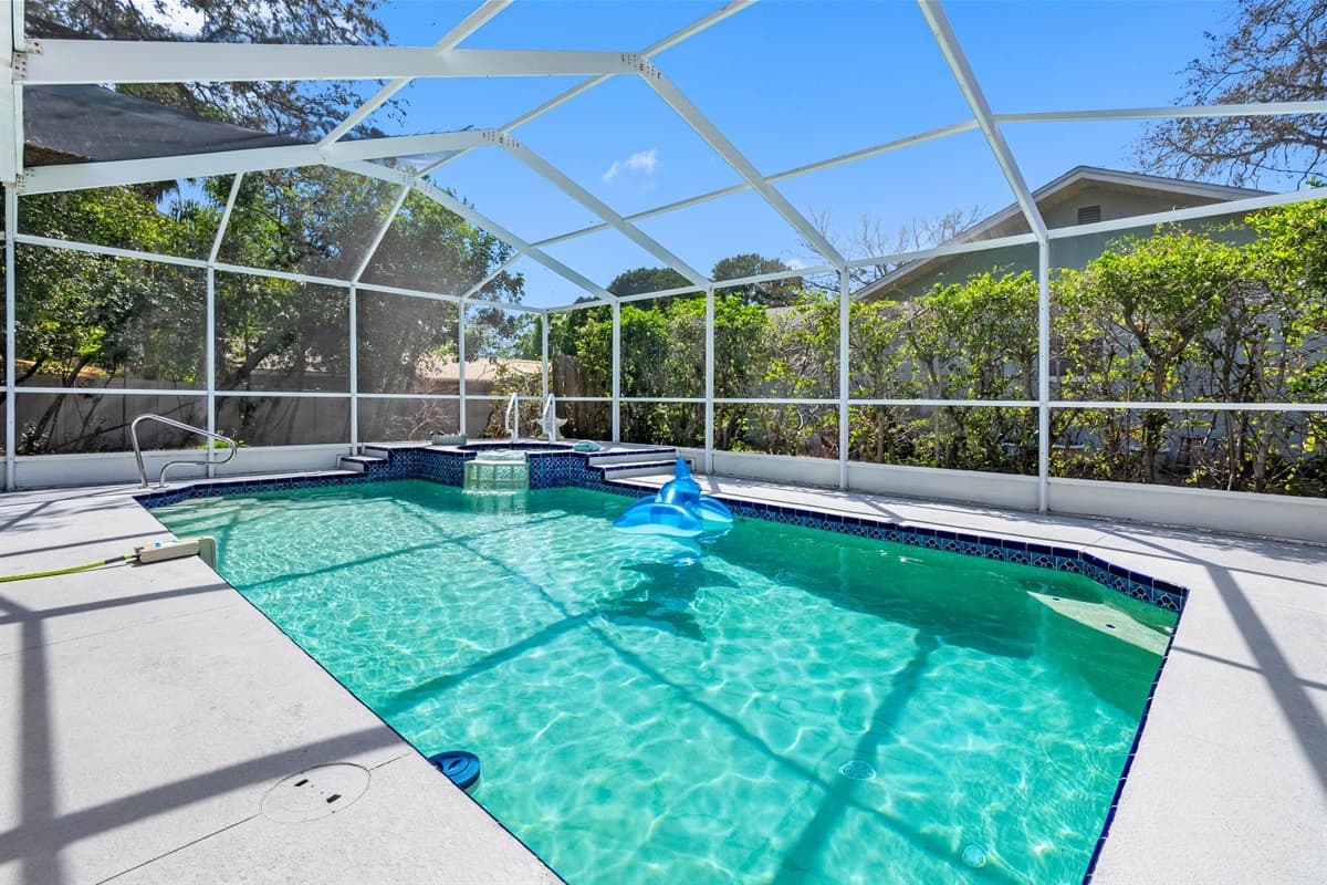 The spacious pool area invites you to take a refreshing dip at any time of day!