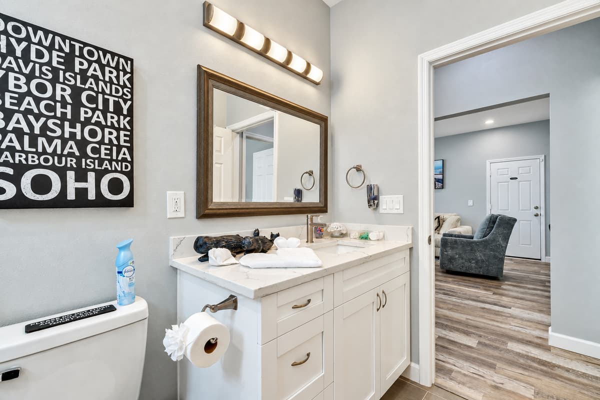 Delicate tiles, quaint fixtures, and soft lighting create a warm and inviting ambiance.