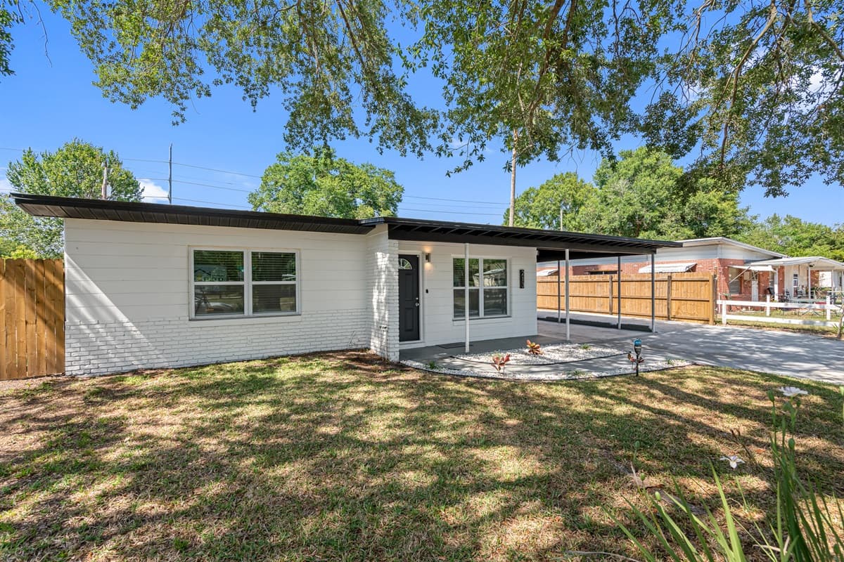 As you make your way up the spacious driveway, you'll notice the beautiful parking available for your convenience.