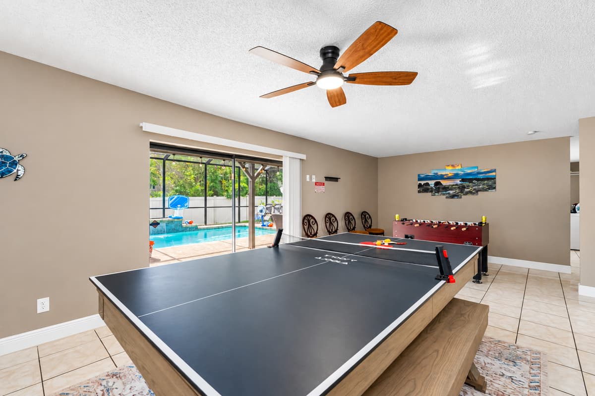 Whether you're enjoying dinner or a competitive ping pong match, this vibrant space delivers endless options for bonding and entertainment.