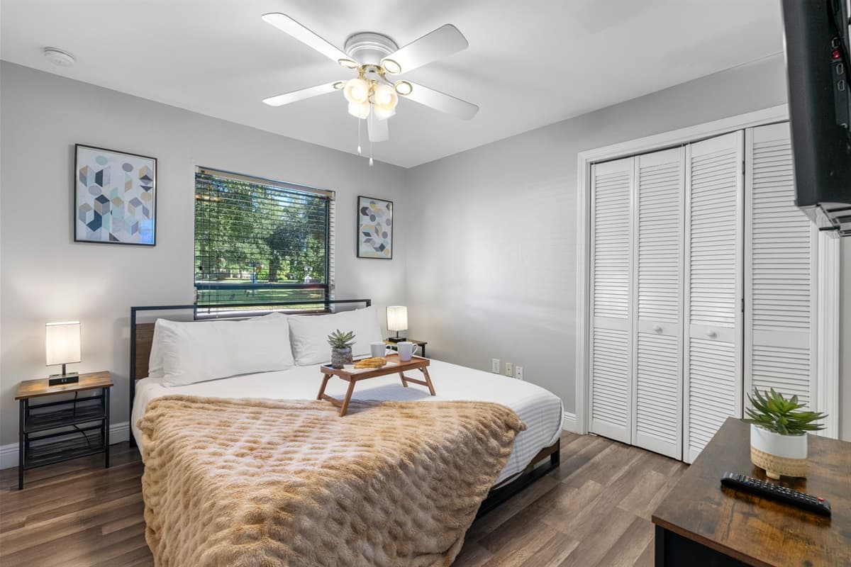 This bright and comfortable room features a luxurious king-size bed and modern décor.
