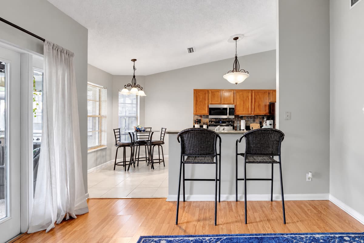 Savor the synergy of design and practicality as you dine in sophisticated comfort.