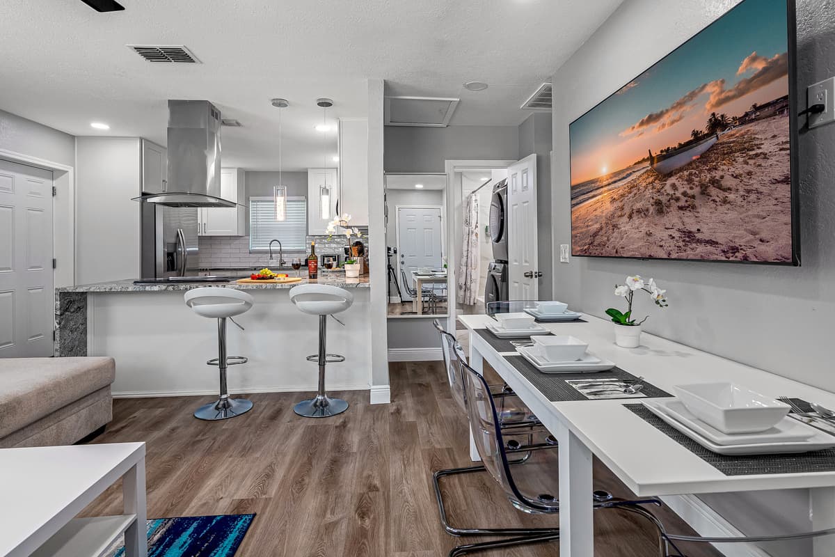 Who wouldn't love the open concept of our beautiful dining area and modern fully equipped kitchen. Cherish wonderful memories with family and friends while on vacation.