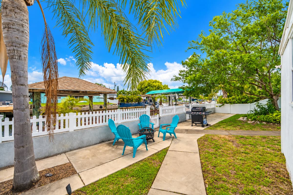 Lovely backyard with comfortable sitting area and griller. Enjoy good food while bonding with family and friends. Don't hesitate and book this property now!