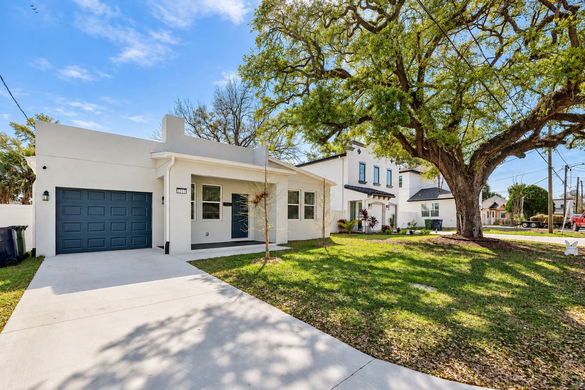 The exterior boasts clean lines, minimalist details, and a harmonious color palette that exudes sophistication and style.