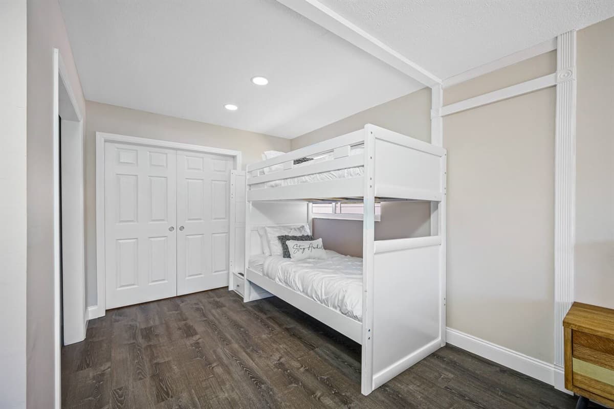 Bunkbed and a queen size bed for a small family or a group of friends who wants to hang out and sleep in one room. It is very spacious and has a very nice view. If you are interested to book this house, Send us a message now!