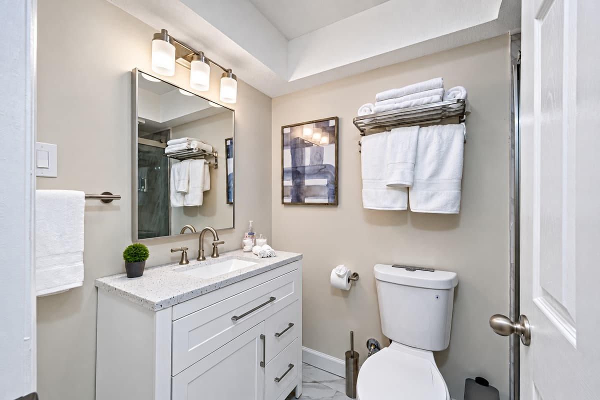 Beautiful bathroom equipped with sink, toilet, and shower. Enjoy a relaxing bath after a long day of travel from your home to your home away from home. If you think this property is for you, send us an inquiry right away!