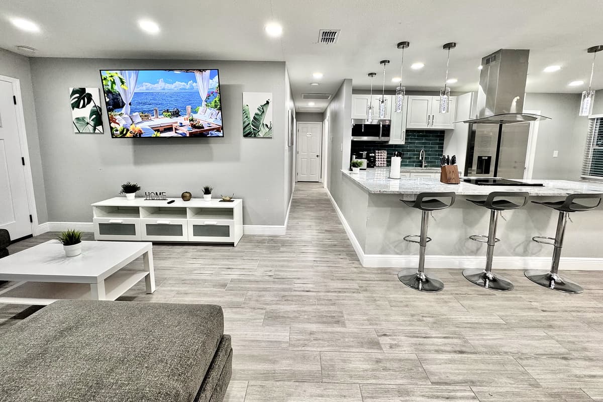 This thoughtful layout encourages interaction and makes it easy to keep conversations flowing, whether you're cooking up a meal, enjoying dinner, or relaxing on the couch.