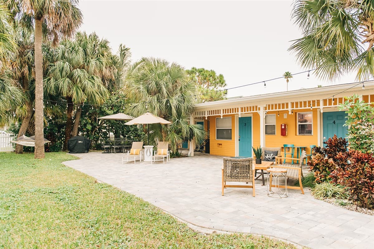 But the allure extends beyond the door; venture outside to the relaxing outdoor common area.