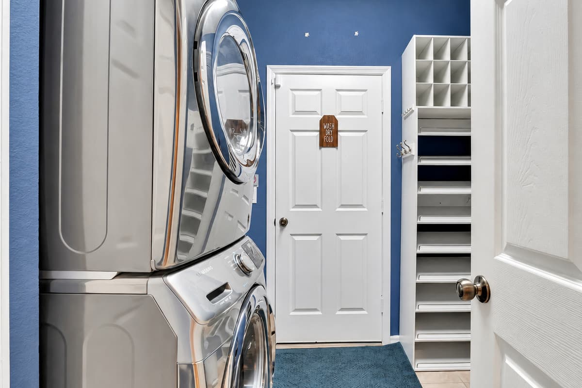 In our laundry room, you'll find a full washer and dryer setup along with essential laundry supplies.