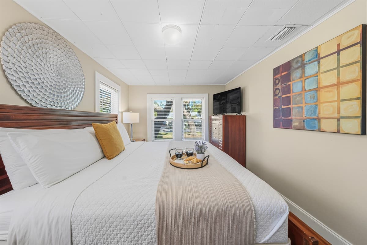 Inviting bedroom with soft tones and a peaceful atmosphere.