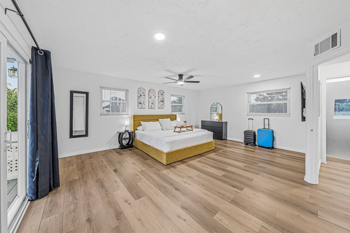 Expansive bedroom retreat with a king bed, open layout, and plenty of space to unwind comfortably 
