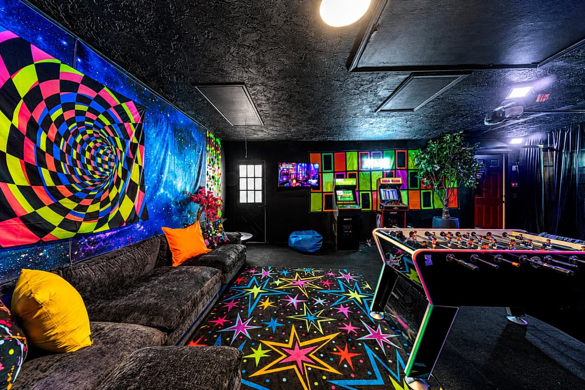 Rainy afternoon? Nobody notices. Free-play arcade, air hockey, and a sofa deep enough for whoever's waiting their turn.