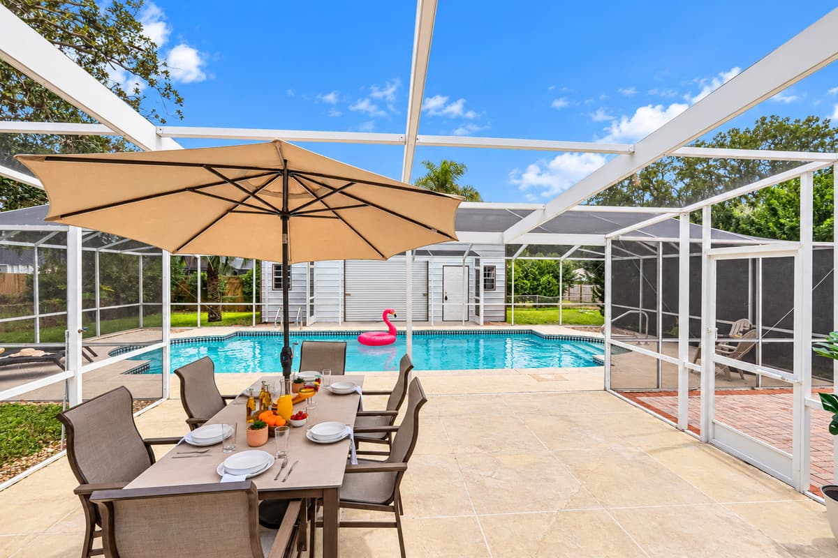 Bright and inviting pool space with ample seating for soaking up the Florida sunshine.