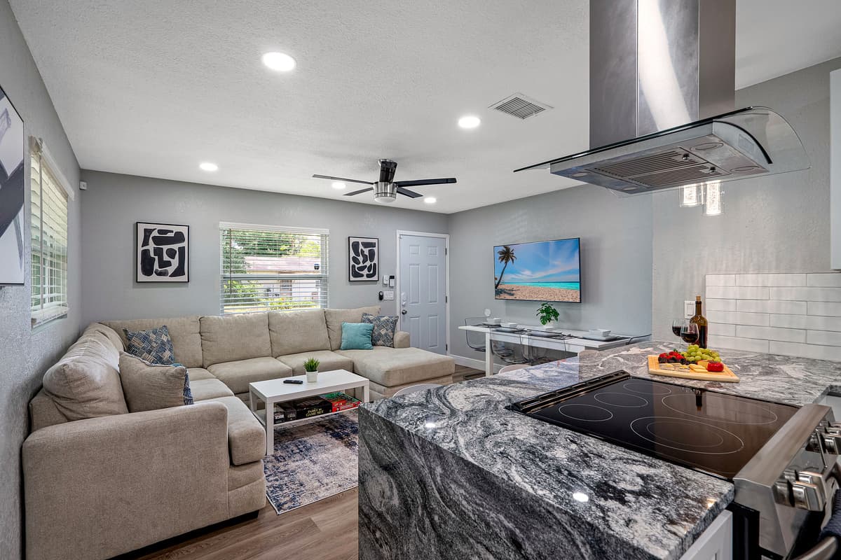 Our spacious living room with comfortable L-Shaped couch where you and your family and friends can bond and relax.