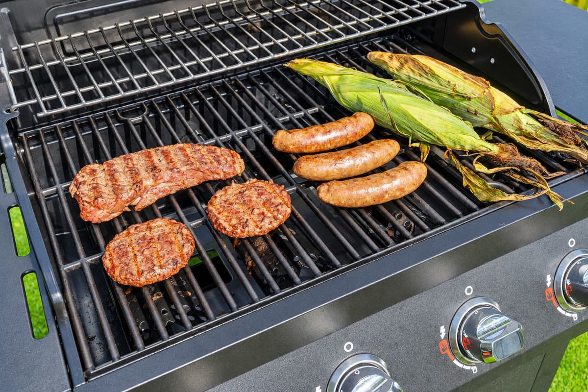 The outdoor grill is conveniently located nearby, making it easy to transition from cooking to dining with minimal effort.