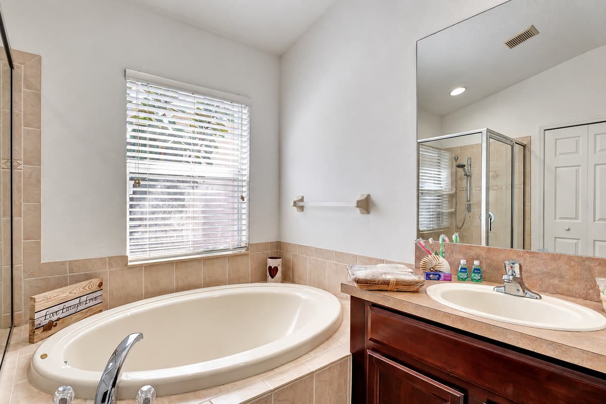 The centerpiece of this bathroom is the inviting bathtub, a haven of relaxation.