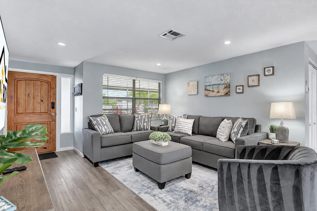 Step into our inviting living room, a spacious haven bathed in abundant natural light.