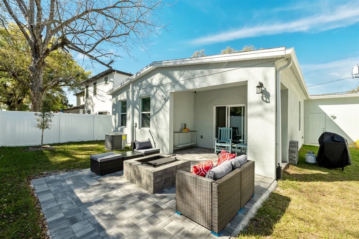Step into our enchanting backyard patio and outdoor common area, where relaxation and enjoyment intertwine amidst the beauty of nature.
