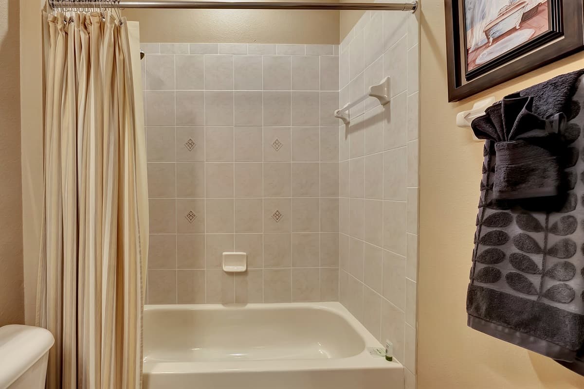 This bathroom is a sanctuary where you can escape the outside world and embrace the comforts of home.