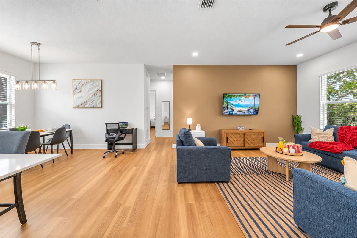 Wide-angle view of the living space showcasing airy layout and modern design.