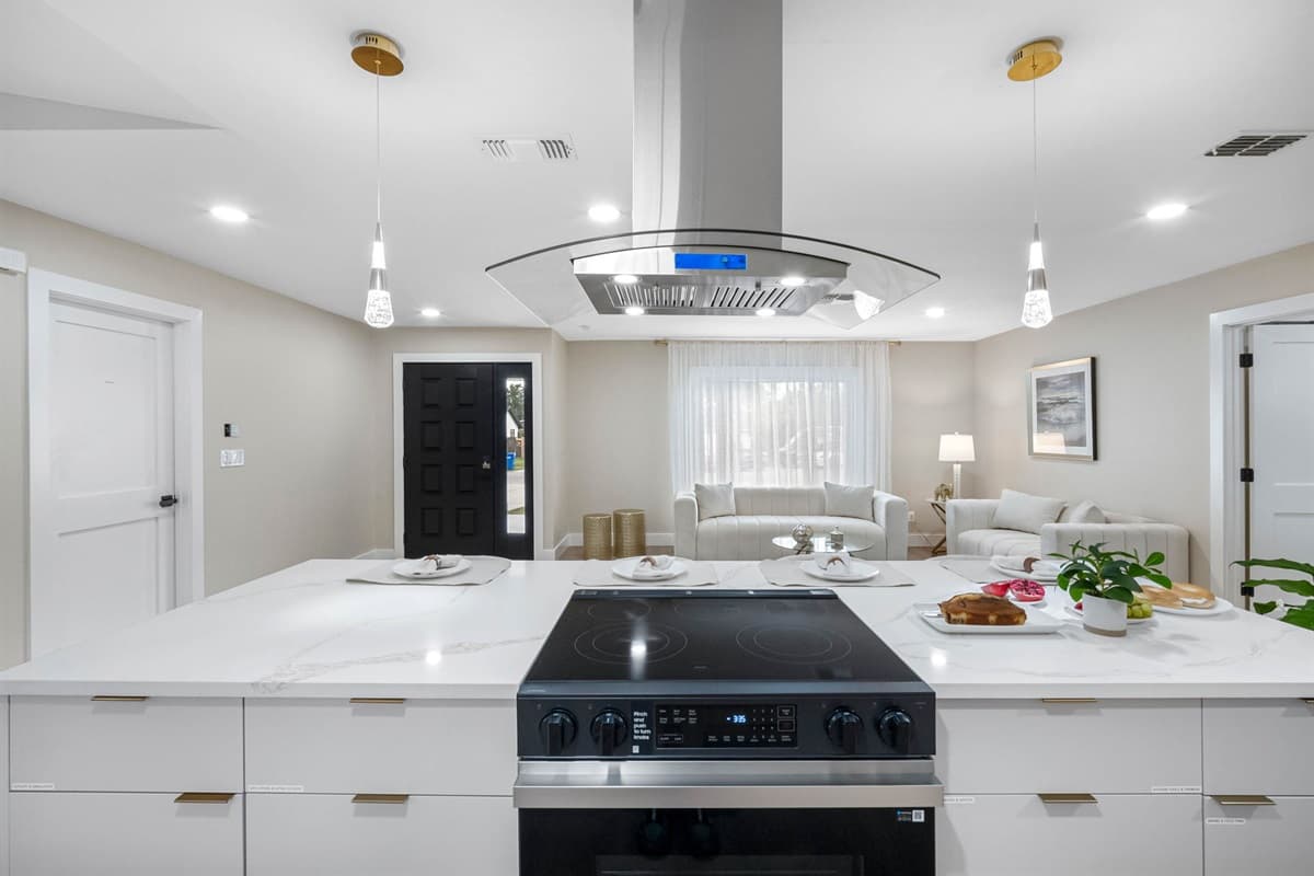 Enjoy cooking in this bright, modern space featuring premium appliances and a large center island.