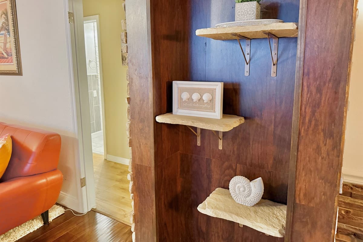 Bright pops of color and warm textures make this the perfect space to unwind after a day at the beach or enjoy a quiet evening in.
