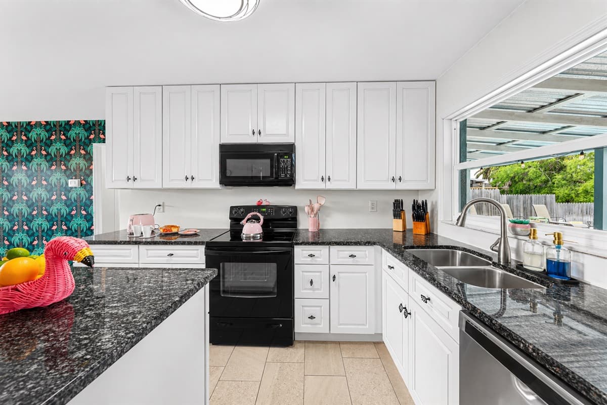 Modern kitchen setup with sleek countertops and everything you need for meal prep.