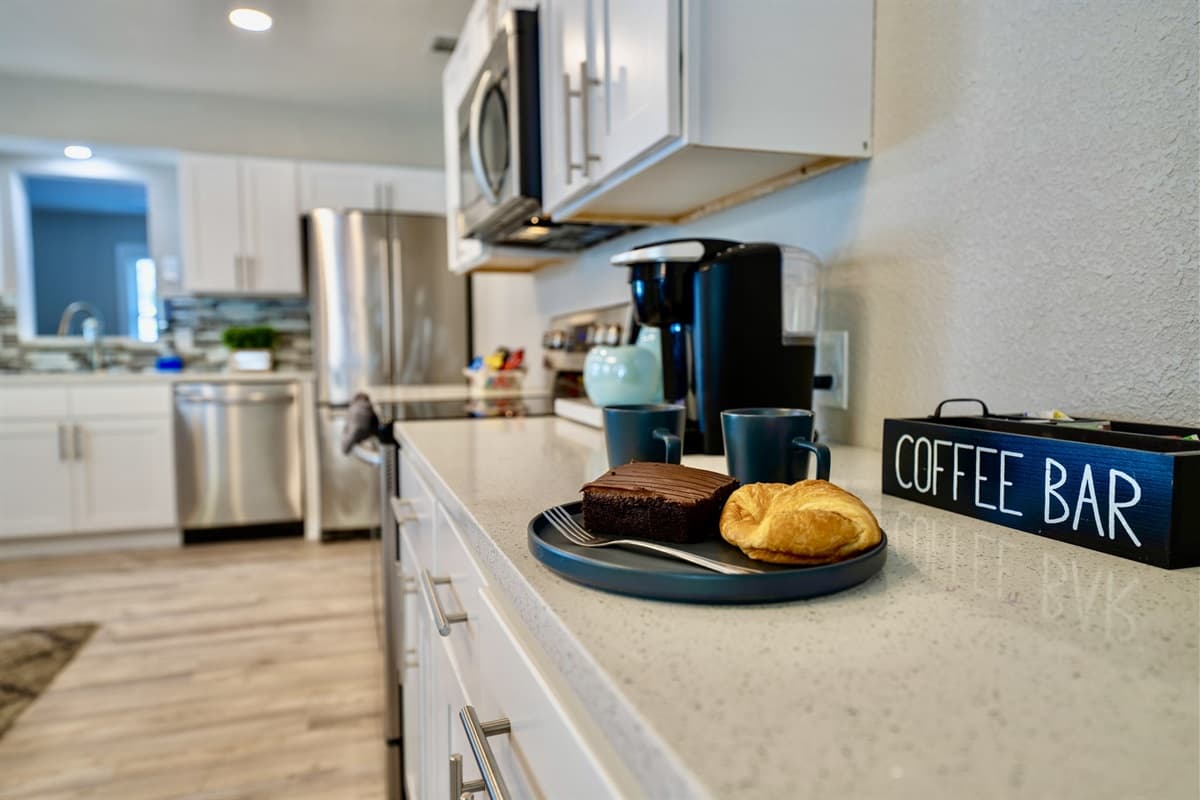 The well-organized cabinets and countertops provide ample storage and workspace for meal preparation and cooking.