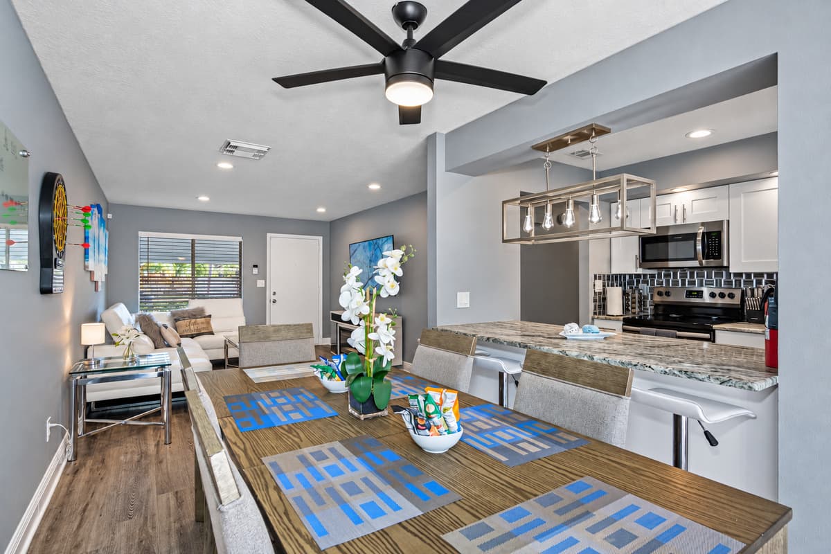 This elegant dining table can seat 6 people comfortably. Share great memories while eating freshly made meals in our modern kitchen! If you like sharing stories with family and friends, send us a message now!