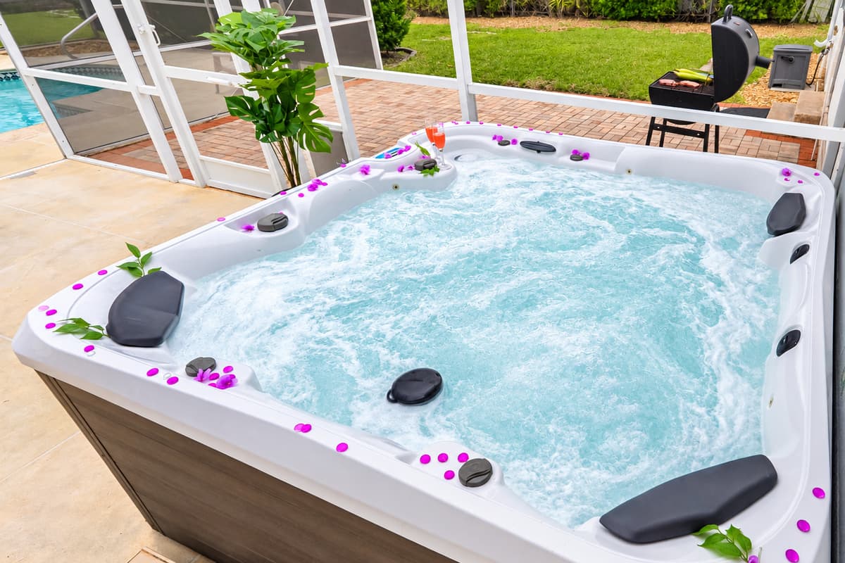 Relax and unwind in the private outdoor hot tub, perfect for soothing evenings after a day of fun.
