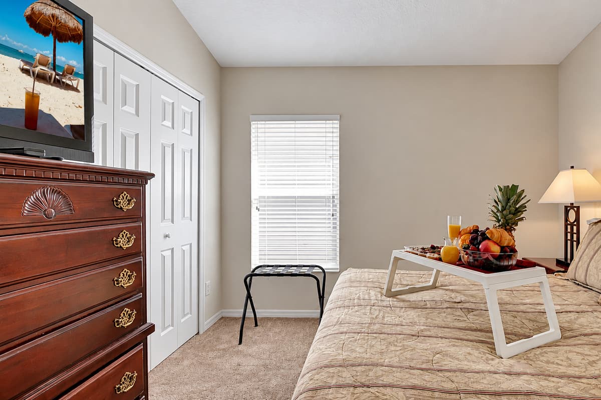 Dominating the room is a lavish queen-size bed, inviting you to surrender to a night of deep, uninterrupted slumber.