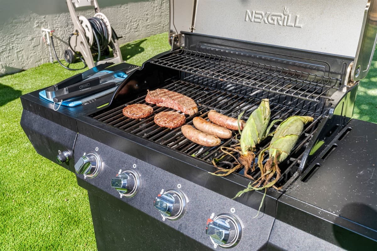 The grill area is spacious, with ample counter space for meal prep and serving.