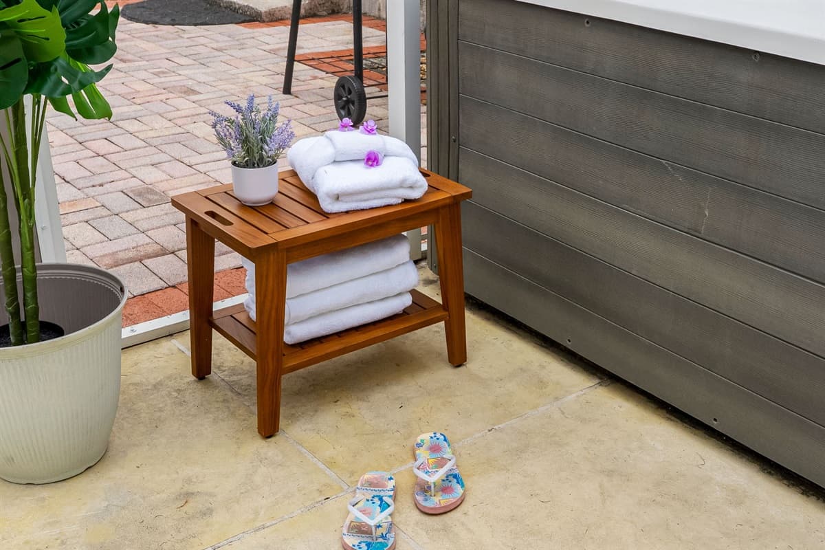 Step outside and soak in the inviting outdoor hot tub, designed for comfort and relaxation.