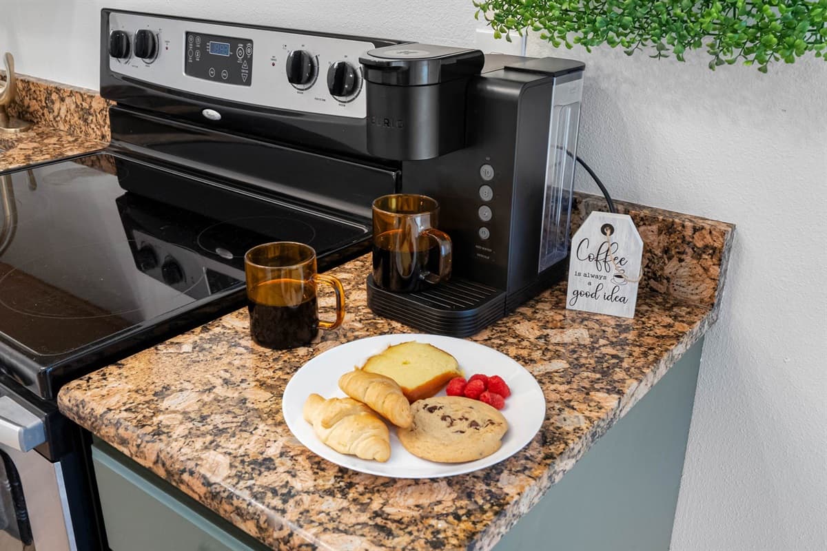 Perfect spot for brewing your morning coffee at the compact coffee station, prepping snacks for the pool, or whipping up a quick meal.