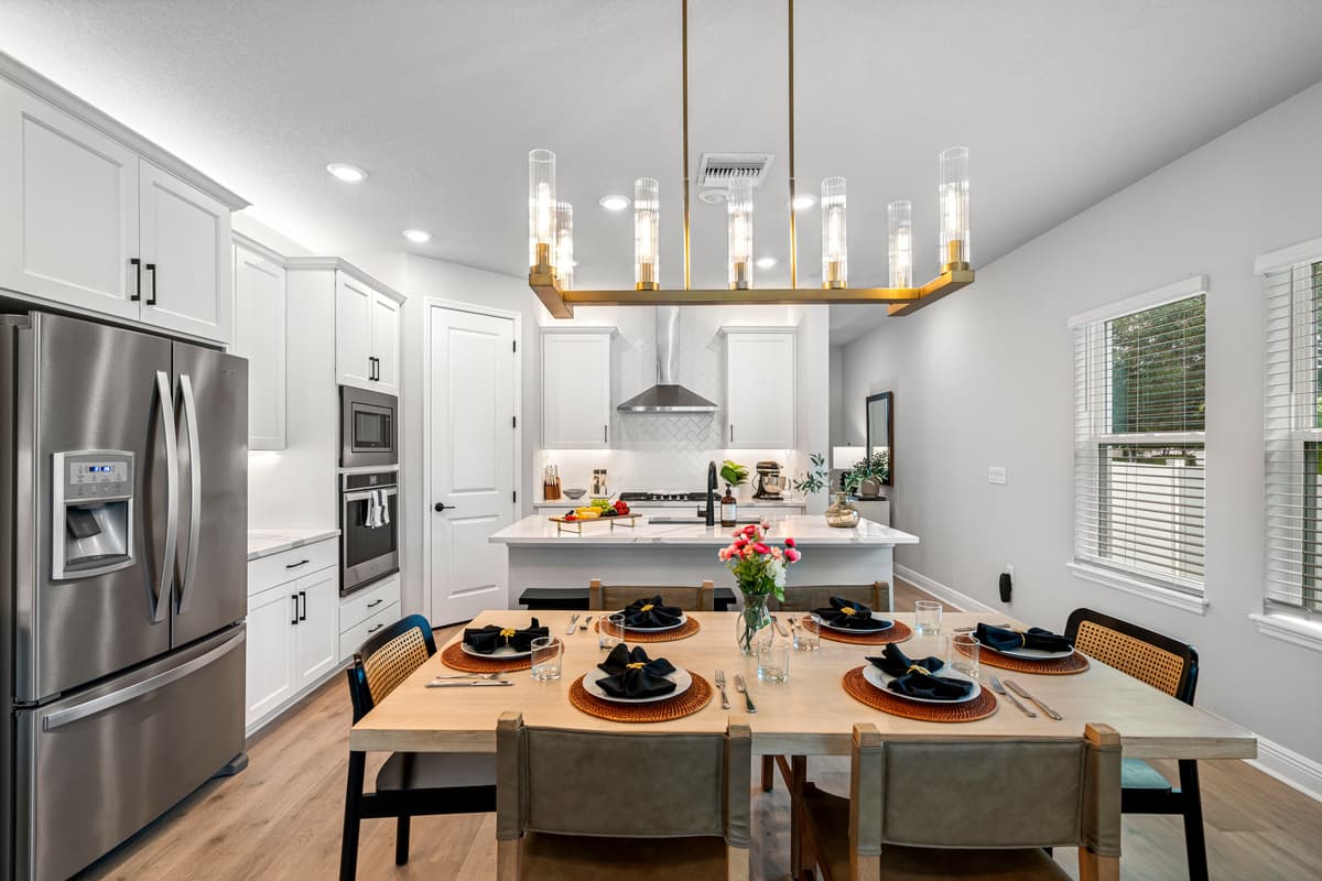 The dining area is a beautifully designed space that exudes warmth and sophistication, perfect for creating memorable moments with family and friends.