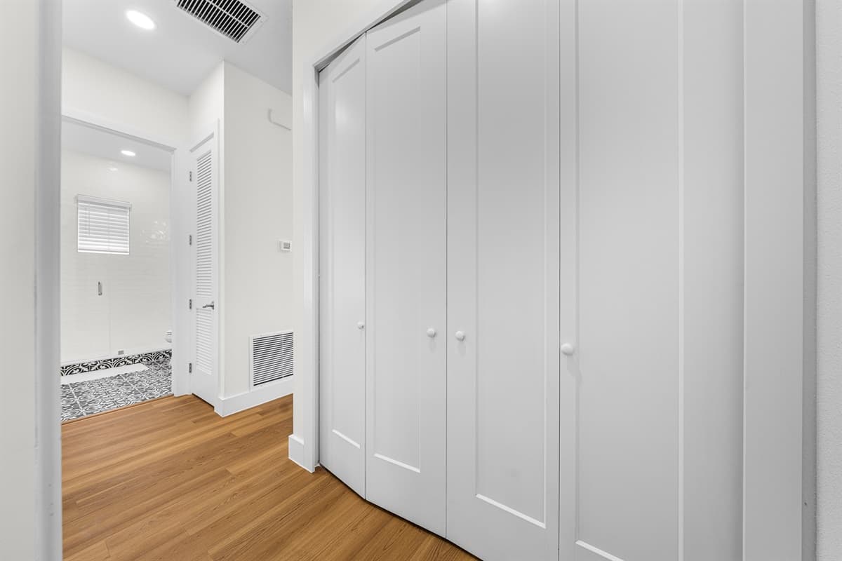 Clean, well-lit hallways connect both bedrooms and bathrooms — a thoughtfully designed layout for easy living.