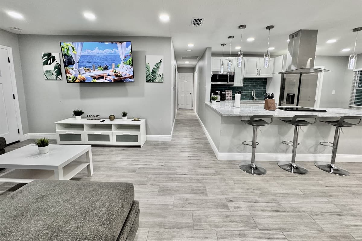 This thoughtful layout encourages interaction and makes it easy to keep conversations flowing, whether you're cooking up a meal, enjoying dinner, or relaxing on the couch.