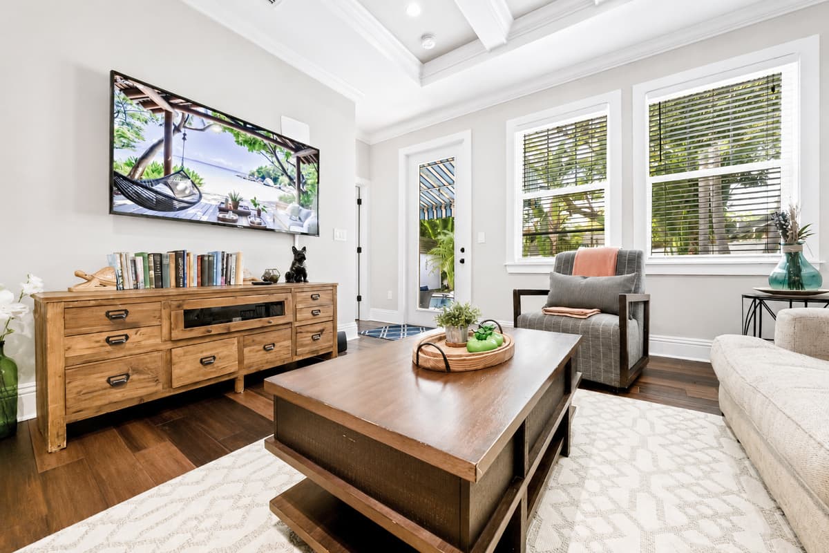 Watch your favorite shows on the large Smart TV while enjoying abundant natural light and comfortable seating.