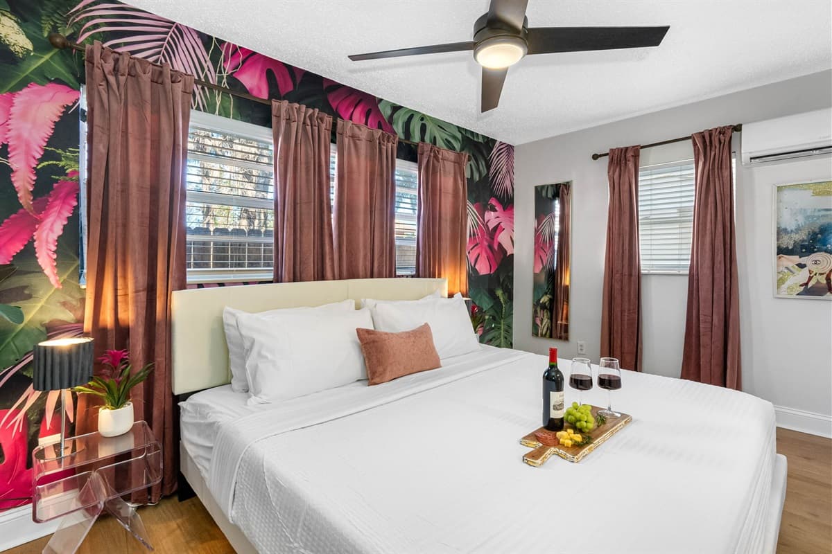 A coastal-themed grandeur envelops the king-size bed.