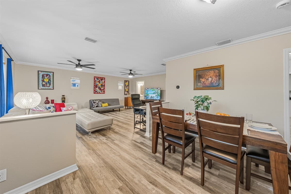 Open-concept layout connecting dining and living spaces for seamless entertaining.