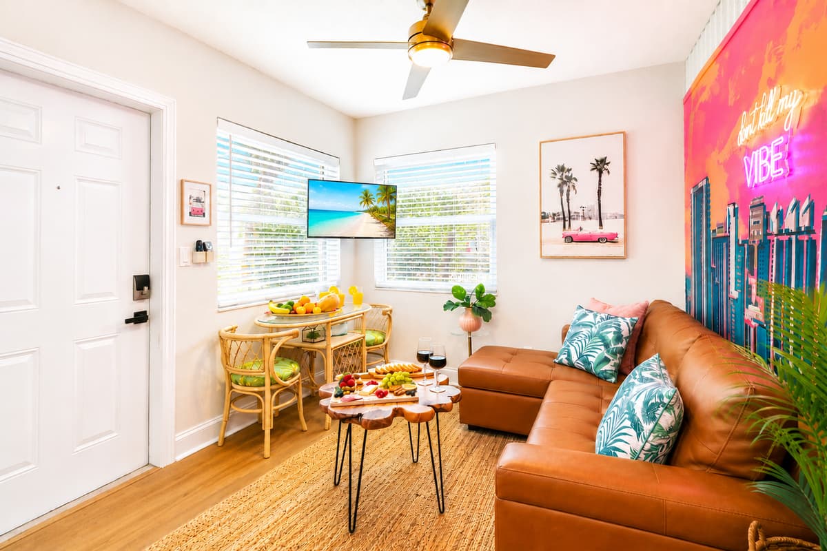 Enjoy a comfortable open space with a Smart TV, cozy seating, dining table, and plenty of natural light throughout the day.