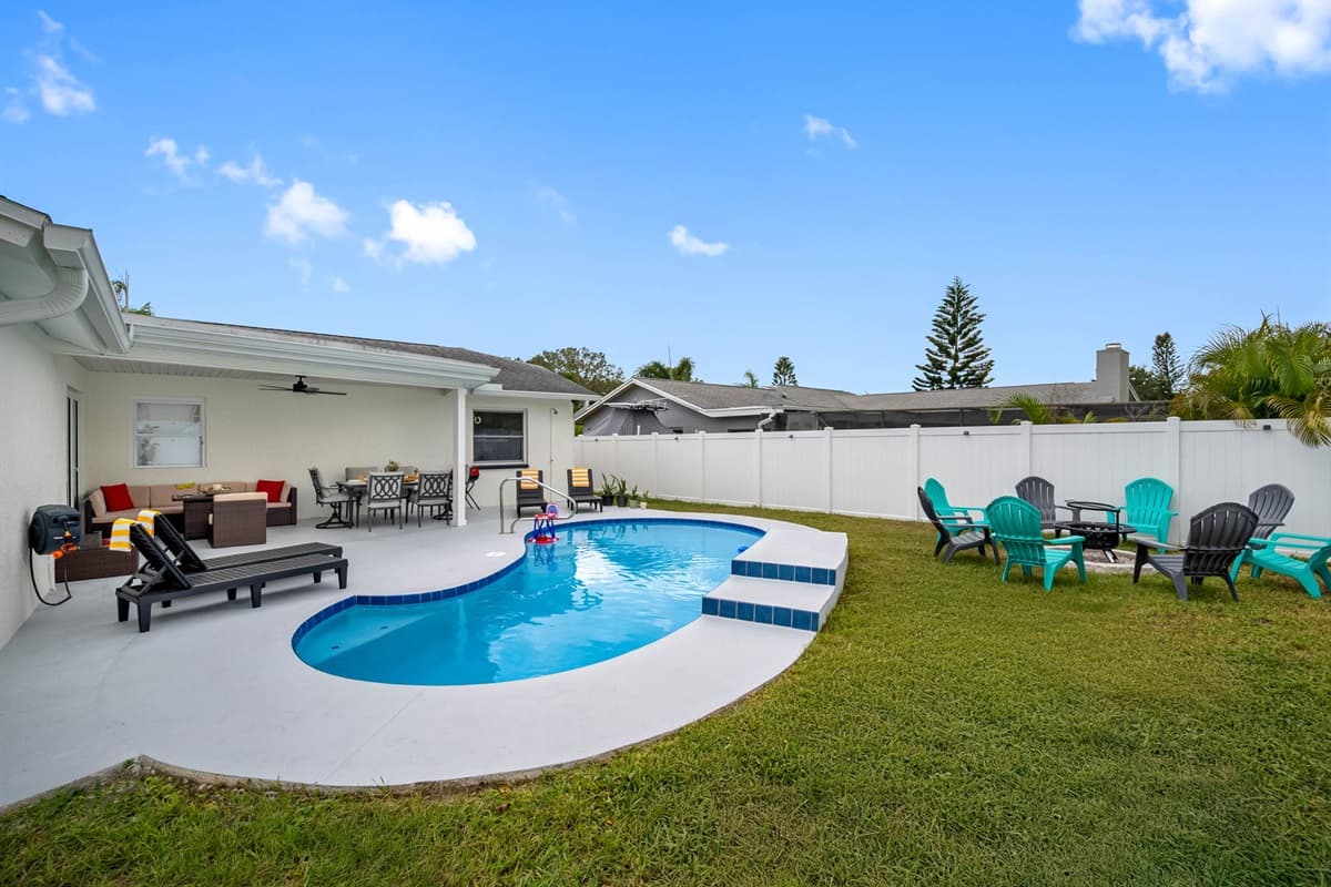 Designed for comfort and connection, this outdoor area blends modern elegance with the relaxed charm of Palm Harbor living.