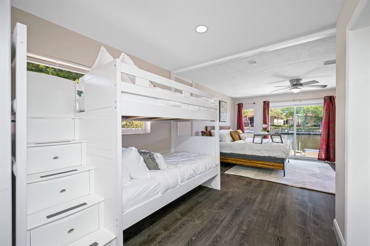 This bedroom is perfect for a small family or a group of friends who wants to hang out and sleep in one room. It is very spacious and has a very nice view. If you are interested to book this house, Send us a message now!