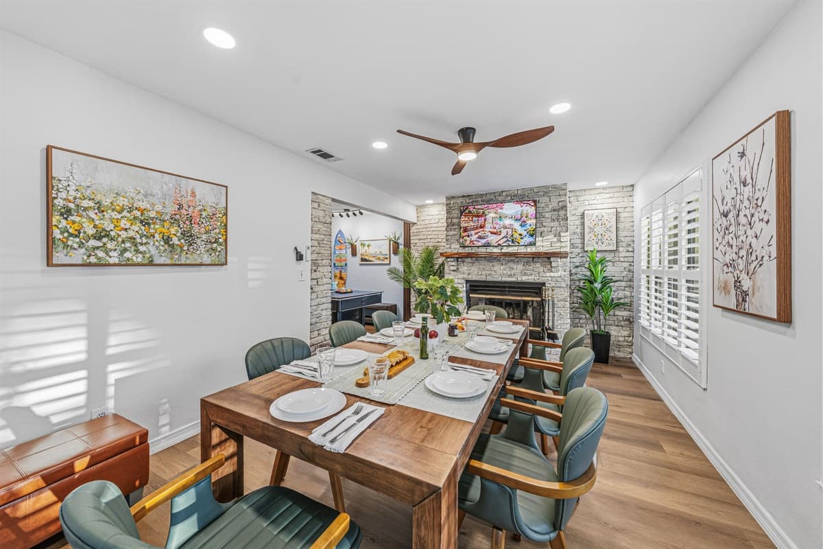 Bright and airy dining space with seating for the whole group and warm, inviting décor 