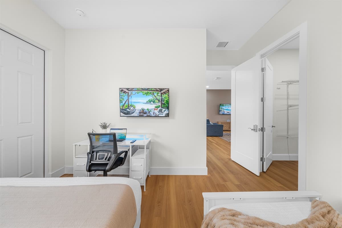 A spacious closet behind that door means you can unpack and truly settle in. This isn't a hotel room — it's your home away from home.
